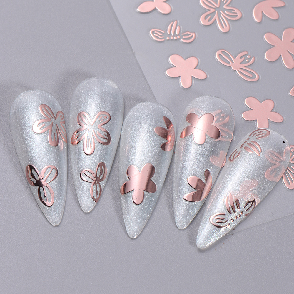 New nail stickers wholesale gilding three-color leaves painted hollow flower black and white star nail adhesive stickers
