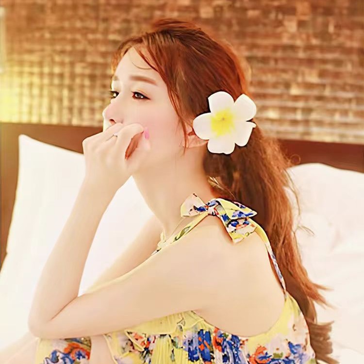 Dai people dress up seaside holiday egg flower hairpin travel photography headdress flower side clip small size fairy hairpin_voghion.com