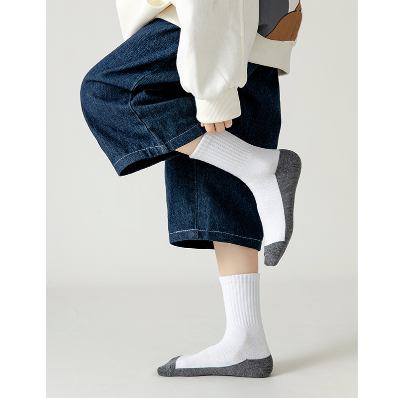 Pure white children's student socks Four Seasons black and white gray cotton mid-tube socks baby socks wholesale sports socks