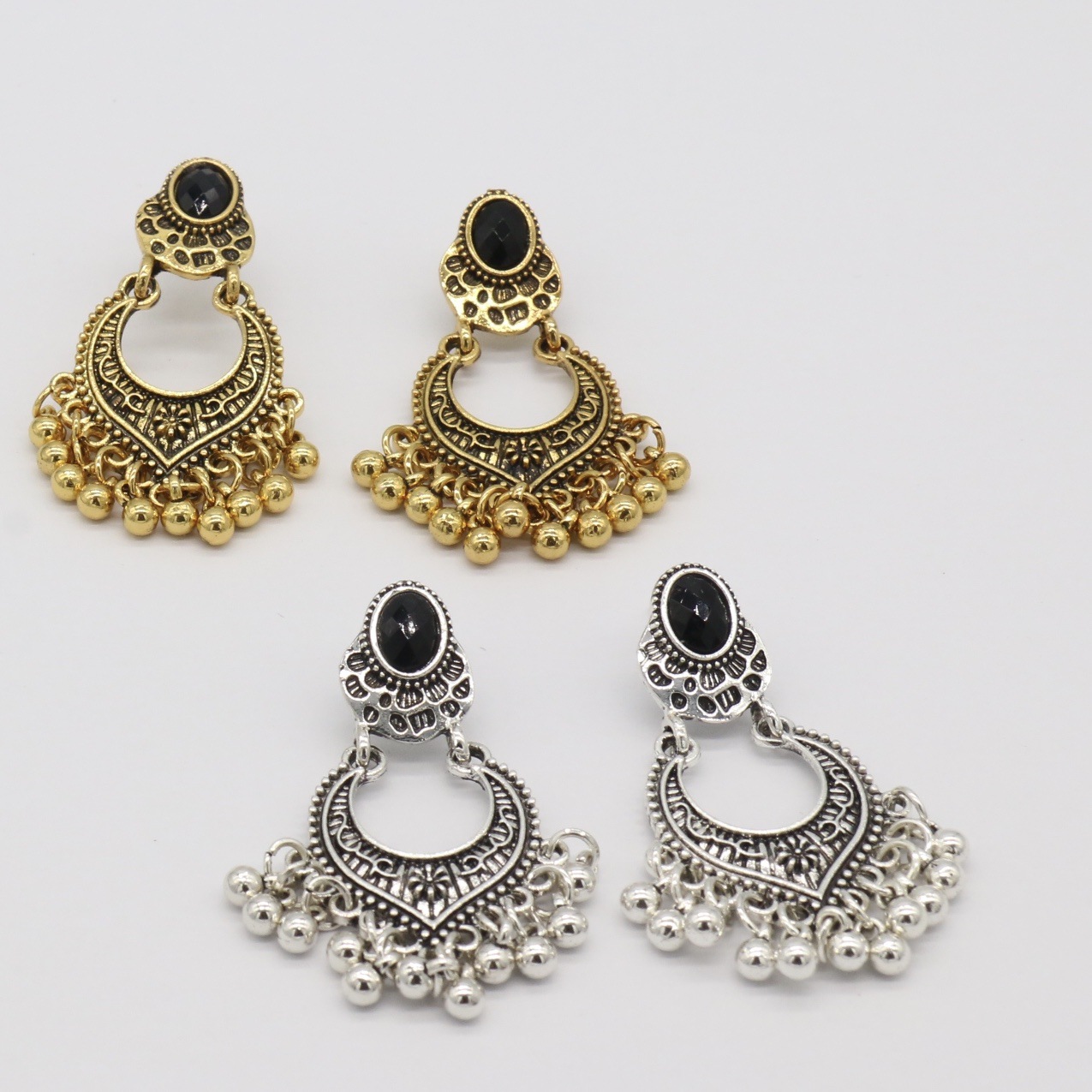 European and American cross-border jewelry fashion vintage earrings ethnic style carved beads black gem tassel earrings