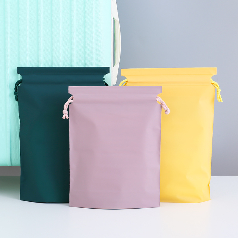 Color bundle pocket frosted waterproof drawstring cosmetics finishing storage bag socks shoes clothing storage bag wholesale