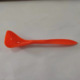 orange spoon