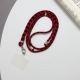 Red and black houndstooth + clip