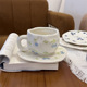 Fresh fruit cups and saucers