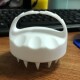 White shampoo brush with short teeth