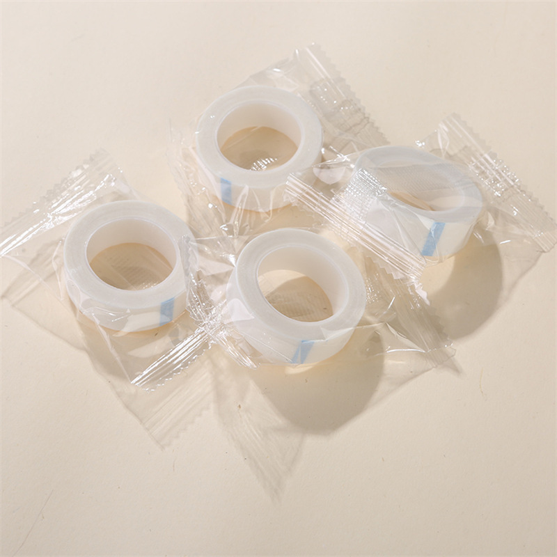 Factory wholesale grafting false eyelashes auxiliary isolation non-woven fabric PE tape separation upper and lower eyelashes breathable tape