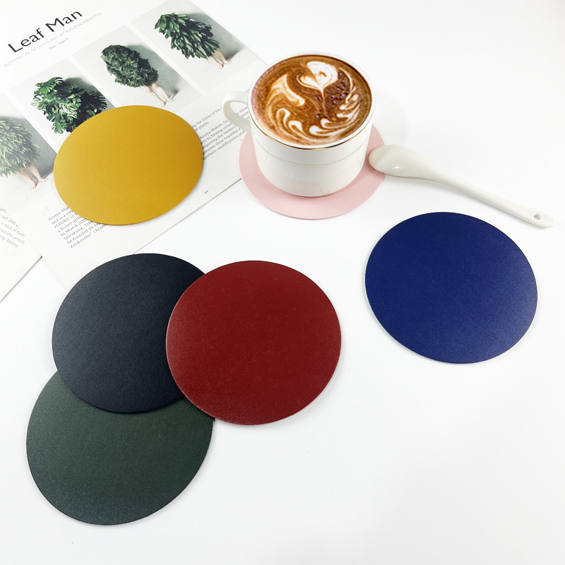 Cross-border double-sided pu leather waterproof non-slip anti-scalding can be set enterprise LOGO coaster leather insulation pad wholesale