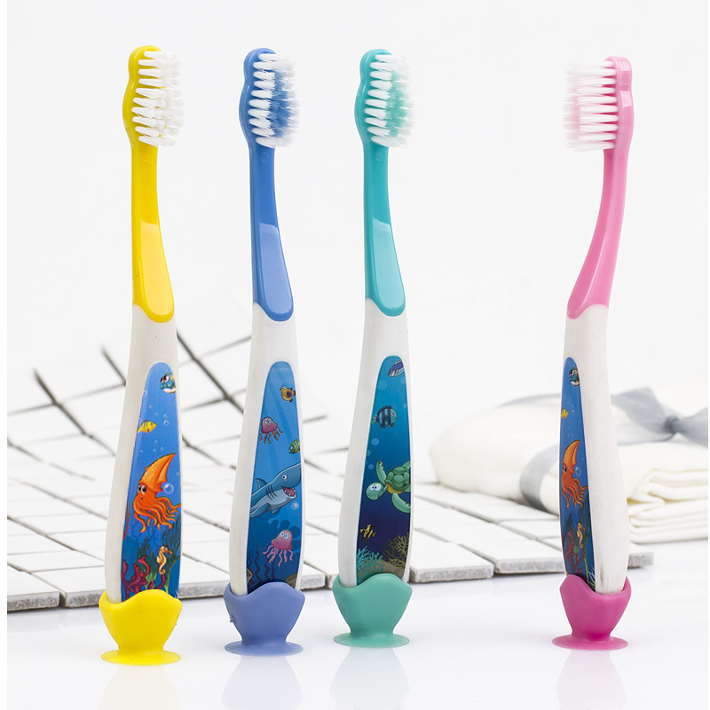 Stall supply 3-12 years old children's toothbrush soft hair cartoon handle foreign trade Macaron baby toothbrush manufacturers wholesale