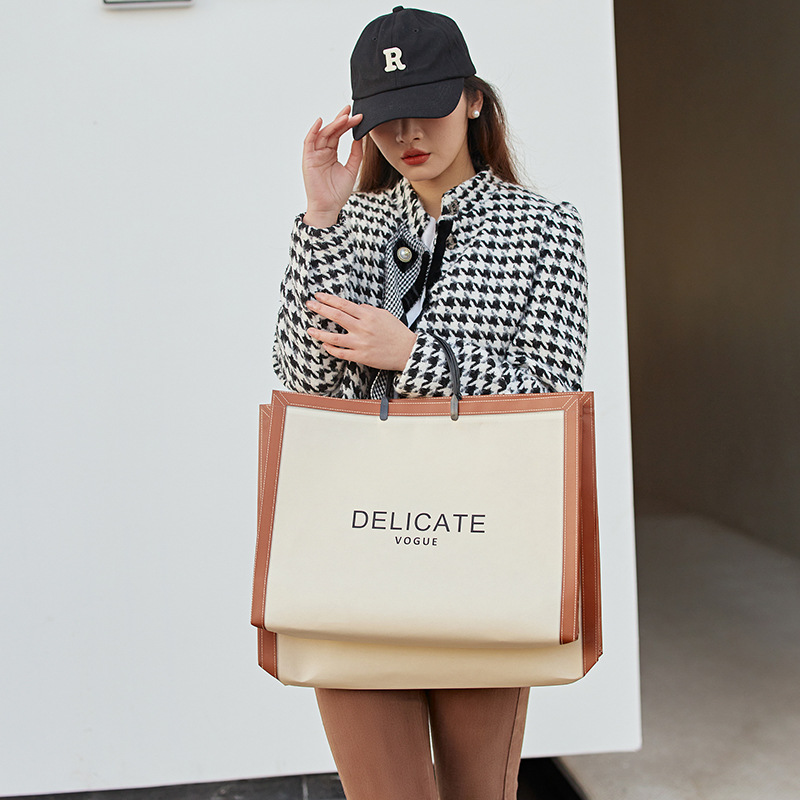 Spot coated non-woven bag portable clothing store bag shopping bag shopping bag fashion women's bag customization