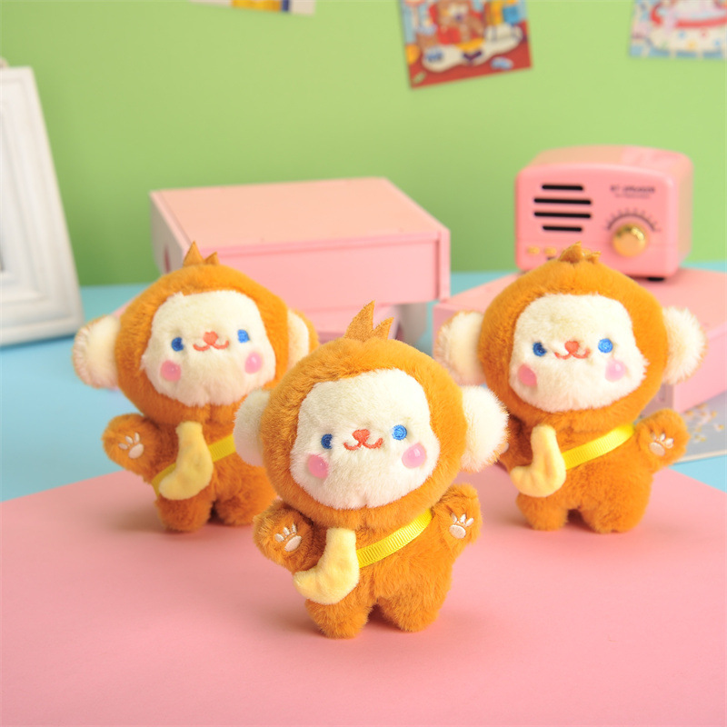 かわいい創意的なリュックサックの掛け物のプレゼントのサルのキーはぬいぐるみのバナナのサルの人形の車のキーチェーンの女性を掛けます。|undefined