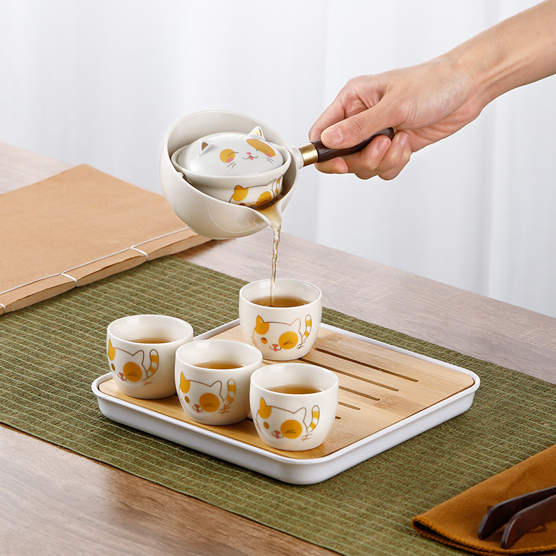 Rotating a Pot of Four Cups Travel Tea Set Accompanying Gift Tea Pot Household Ceramic Side Handle Pot Not Hot Lazy Tea Maker