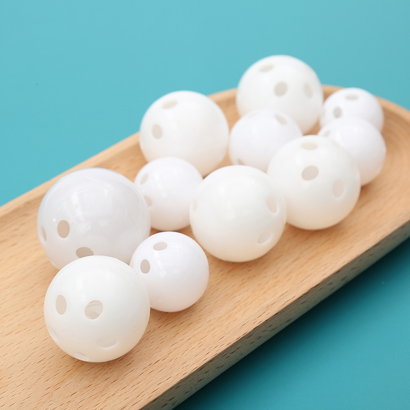 Factory wholesale plastic toy ball hole ball indoor practice ball hole plastic white ball toy ball a variety of optional