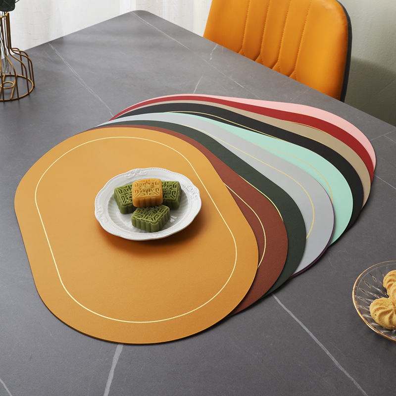 Factory direct supply Nordic style two-color contrast oval leather placemat hotel household waterproof, oil-proof and heat-insulating placemat