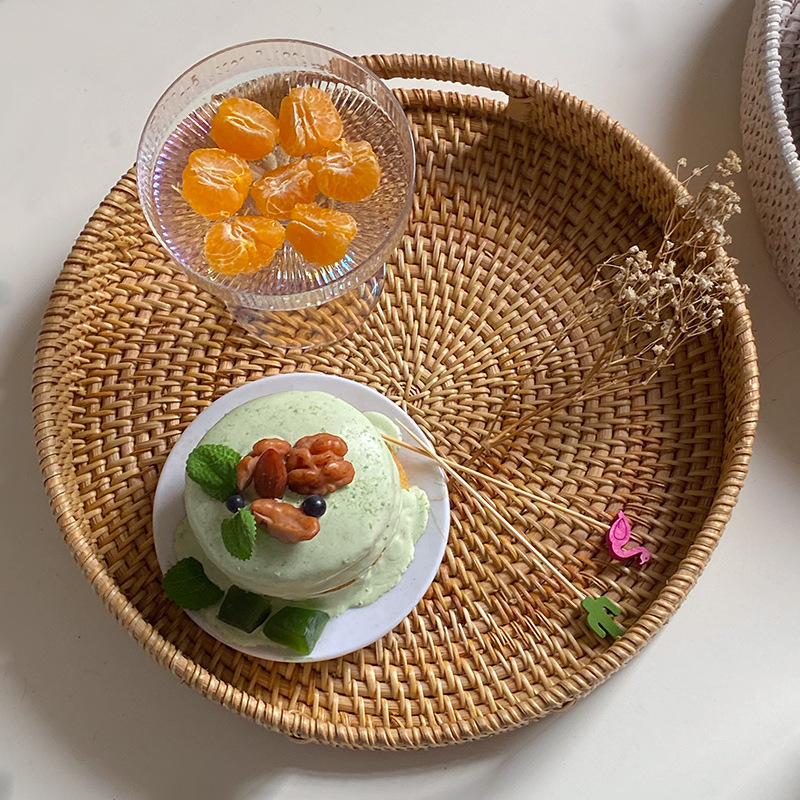 手作りの藤のかごは編んで軽くて豪華な収納の果物のかごのキャンディーの間食のコーヒーのパンのお菓子の皿のトレーはかごを収納します。|undefined