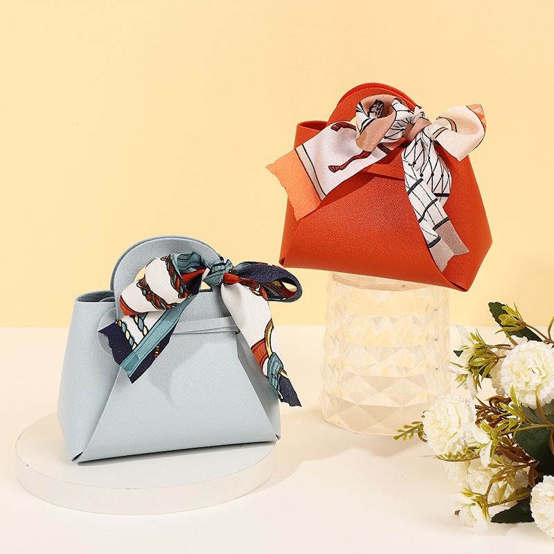 新商品の赤い本INS風創意皮質喜糖箱シルクタオル手提げ式結婚祝いキャンディー袋卸売り|undefined