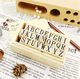 26 lettered stamps/one 100