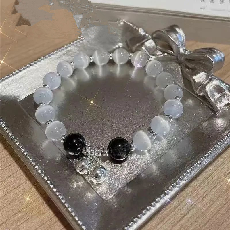 Shake the sound of a lot of explosions bracelet wholesale Yiwu girlfriends couple bracelets imitation cat's eye Moonstone bell crystal bracelet