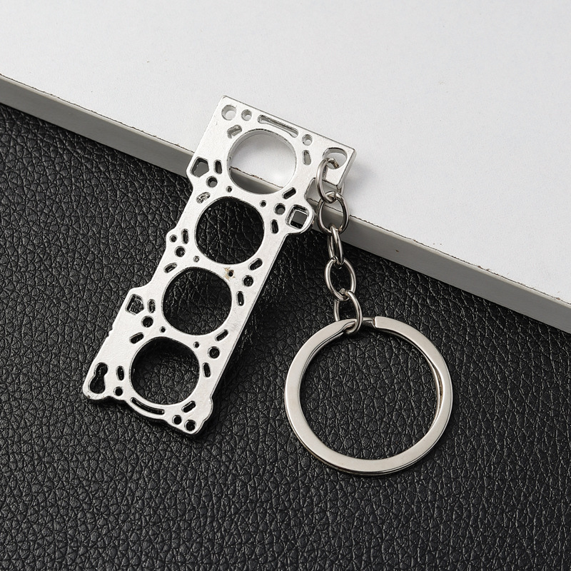 Creative car cylinder engine gasket keychain pendant car metal model key chain gift wholesale