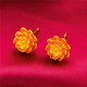 A pair of No. 5 earrings with earplugs