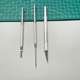 Seven needles + detail needles + pencil sharpener