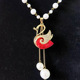 34. White chain Red single Swan