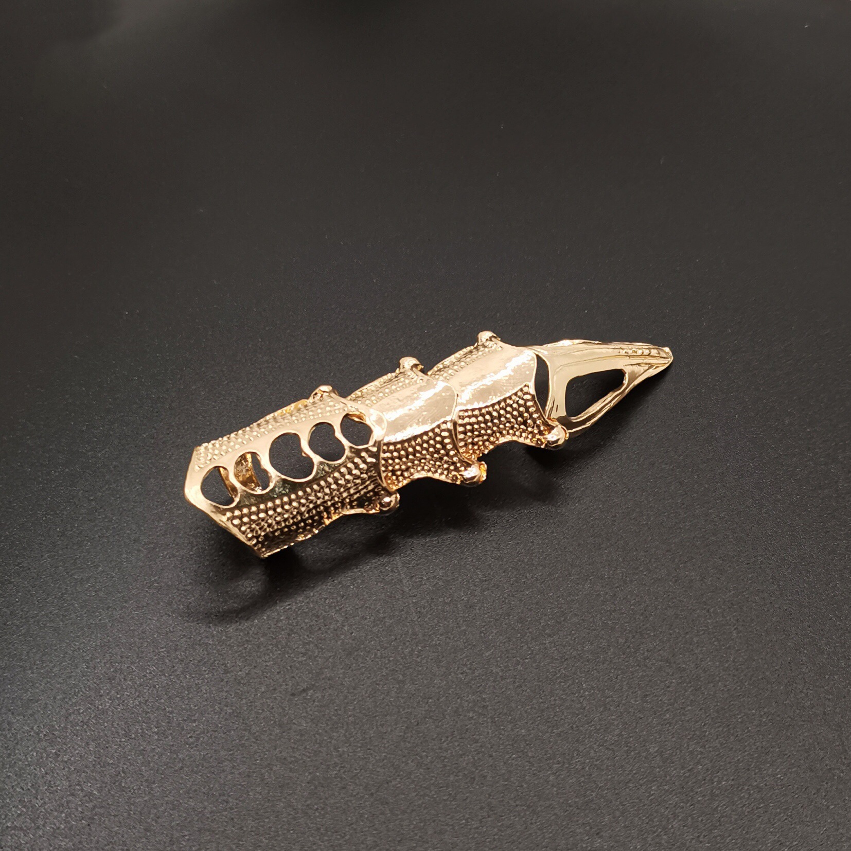 Jewelry manufacturers supply European and American retro punk cool pointed long joint ring four section ring