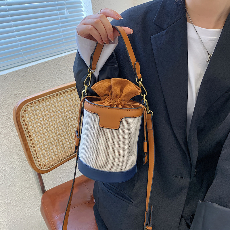 新款韓版女包抽繩手提水桶包時尚流行單肩包一件代發時尚斜挎包