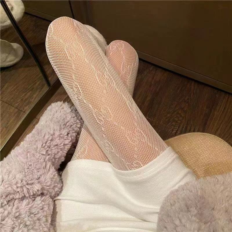 ネットの靴下の月の蝶のアルファベットktの薄い金の愛の連足の靴下の透かし彫りの漁網の靴下insの潮|undefined