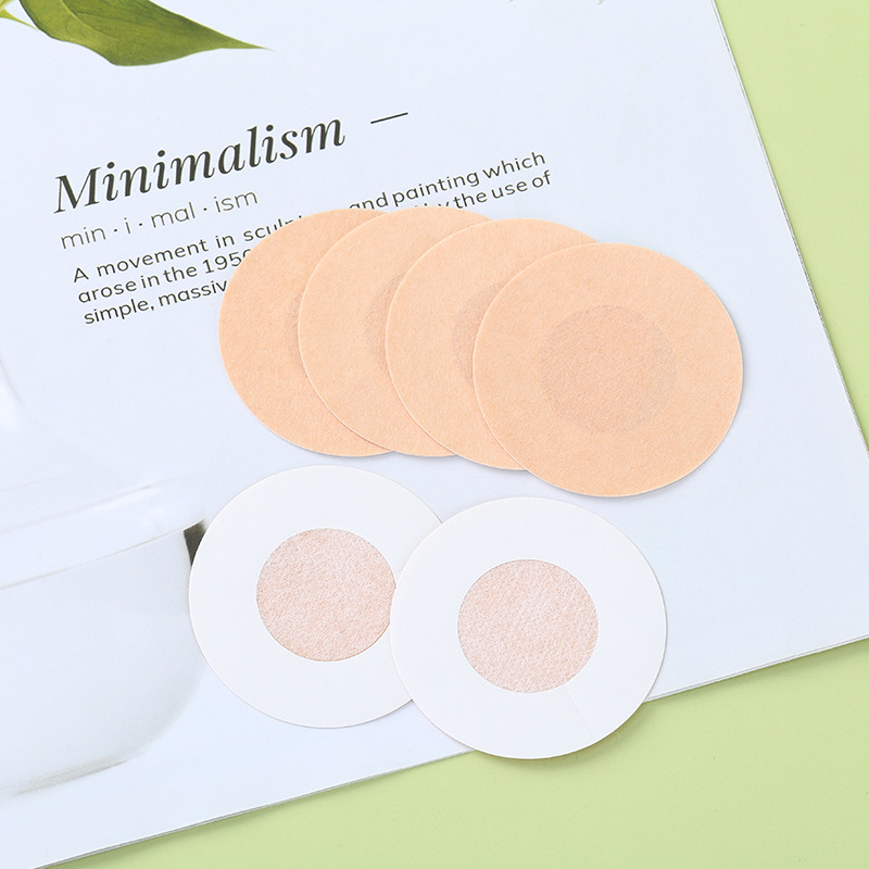 Disposable plum blossom breast patch disposable non-woven chest patch anti-light nipple patch invisible seamless chest patch wholesale