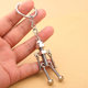 Factory wholesale robot retro handmade diy keychain pendant mobile robot movable screw man