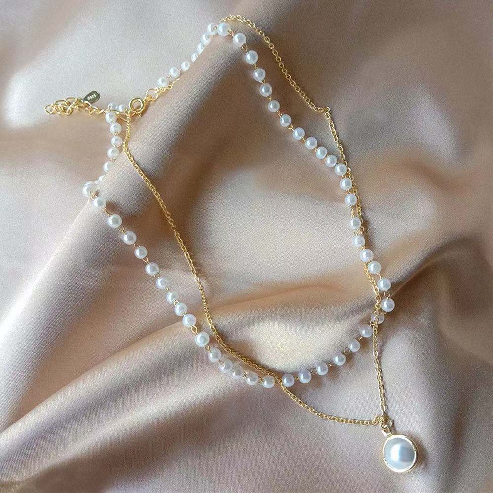 Japanese and Korean hot new fashion pearl necklace personality simple clavicle chain female gold double layer necklace foreign trade jewelry