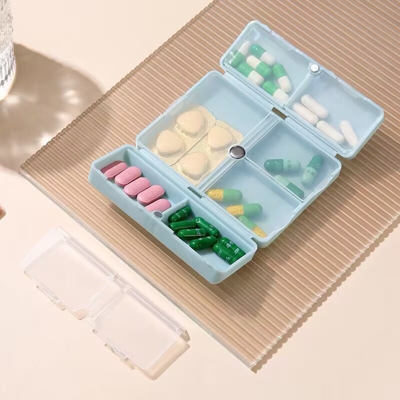Wholesale portable 7-grid pill box independent folding double-layer storage box magnet magnetic seven-grid pill box