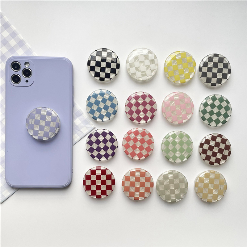 Cross-border foreign trade chessboard glue drop solid color transparent airbag bracket lazy retractable desktop mobile phone bracket DIY