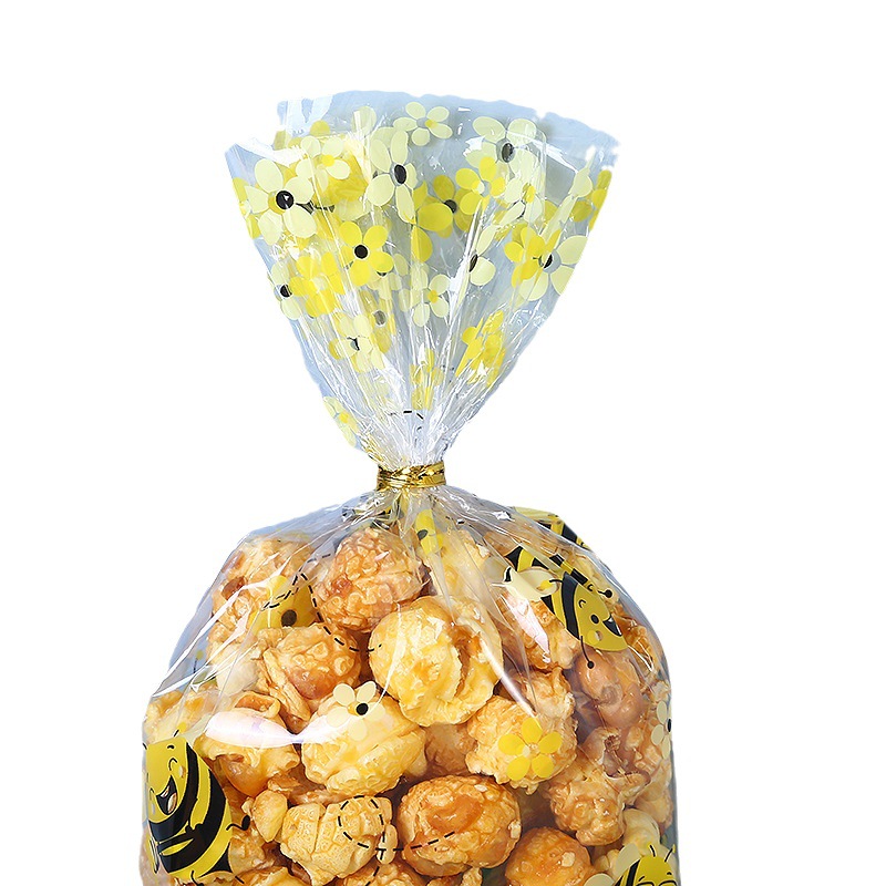 Spot small bee printing bag opp transparent flat bag candy biscuit packaging bag sealing tie silk plastic bag