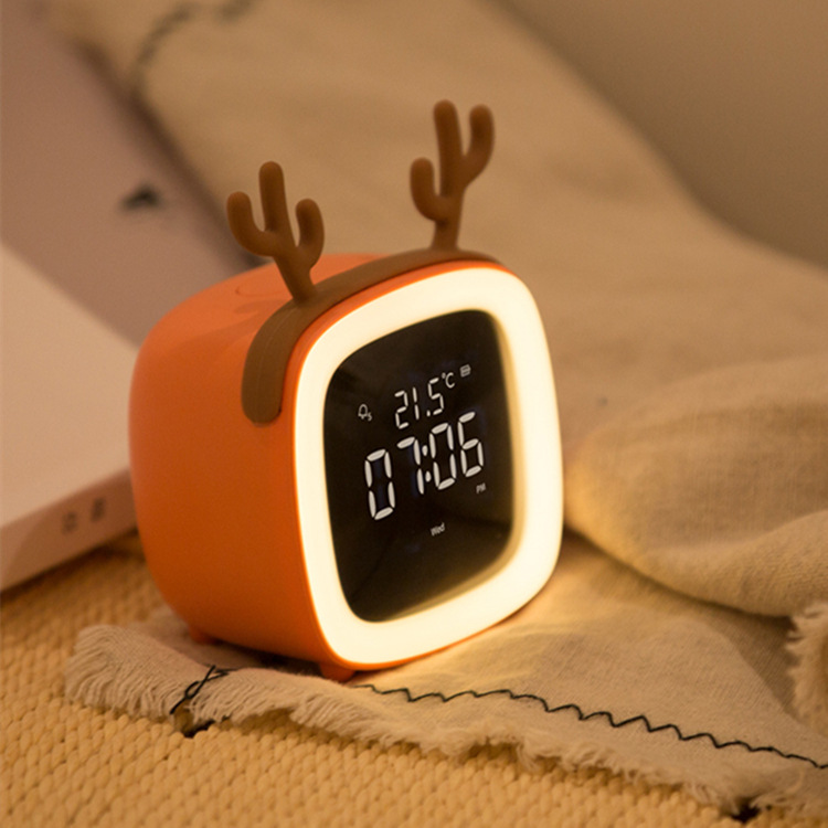 USB cute pet snooze TV alarm clock children cartoon LED charging clock bedroom bedside wake-up light TV alarm clock