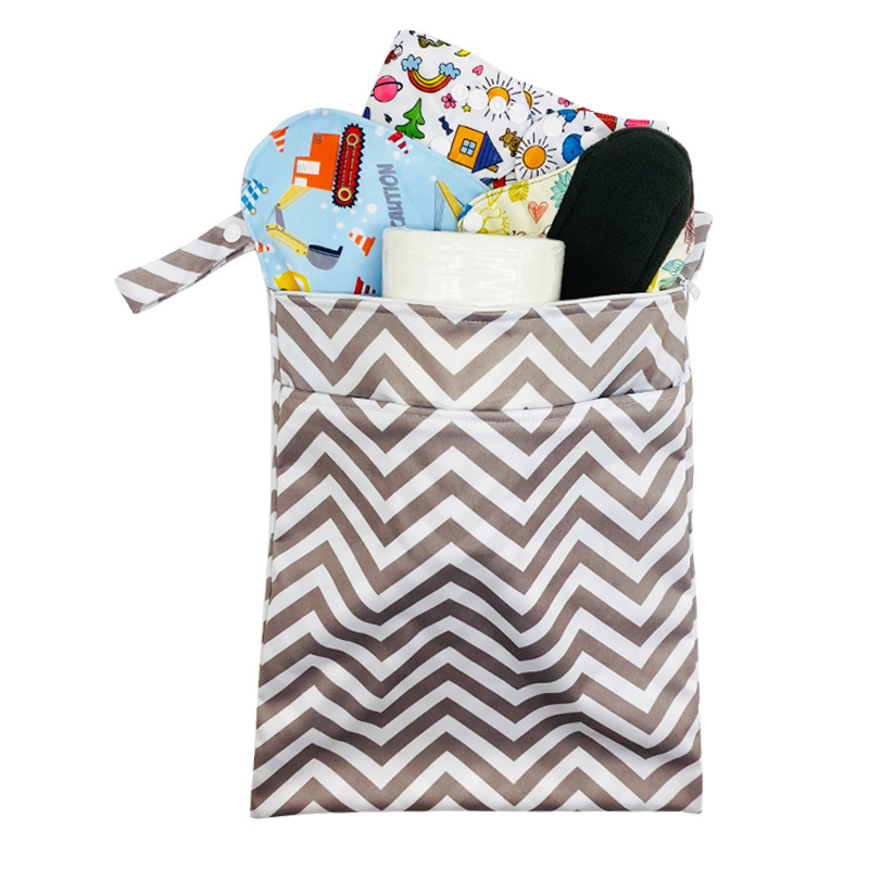 Maternal and infant manufacturers spot baby diaper waterproof storage bag double zipper printing dry and wet separation bag trolley hanging bag
