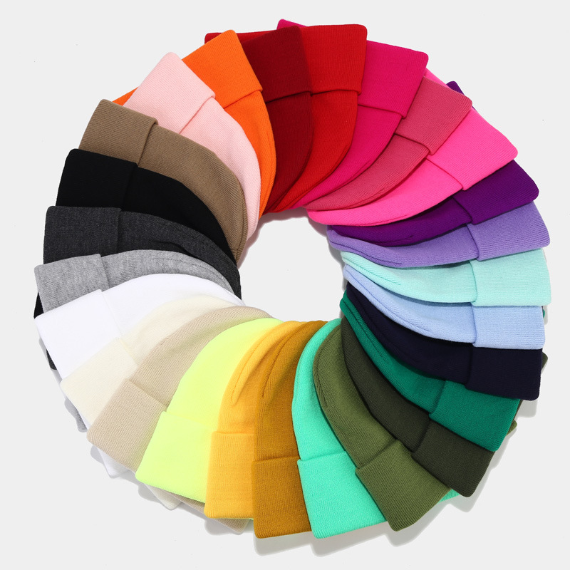 Autumn and winter New knitted hat women's solid color light board pile hat men's outdoor cold hat high quality fashion warm hat fashion