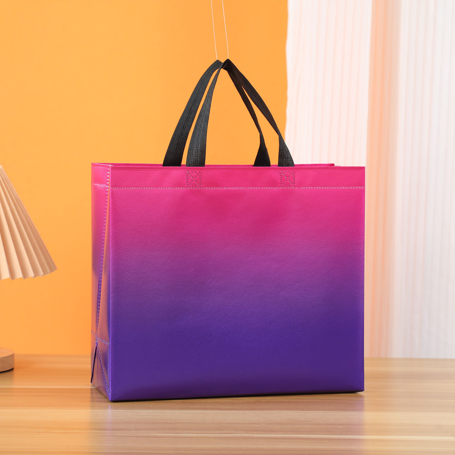 Cross-border gradient color laser laminating aluminum non-woven bag wholesale handbag printing logo gift bag shopping bag