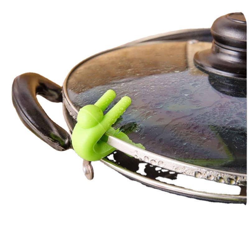 Little man raised pot lid anti-overflow device kitchen pot lid heightening device prevent soup from overfilling pot silicone pot lid rack