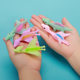Catapult dinosaur launch small dinosaur decompression flexible glue new strange fun toy desktop decompression stall toy