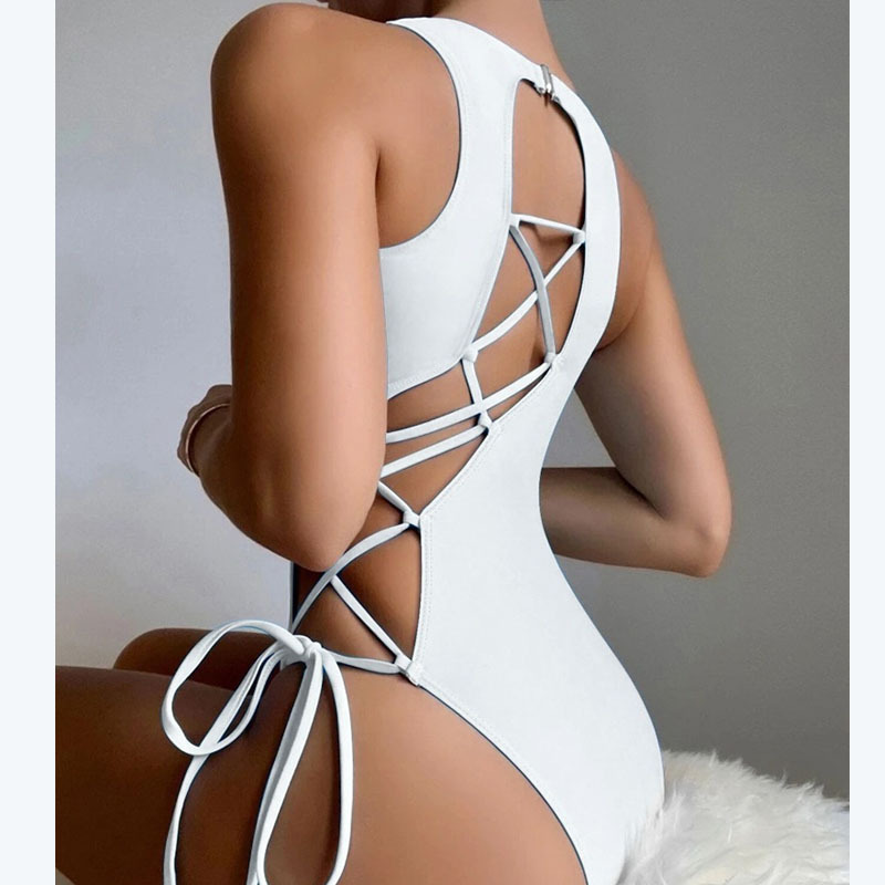2024 new sexy European and American solid color lace-up swimsuit women's foreign trade triangle belly beach bikini swimsuit wholesale