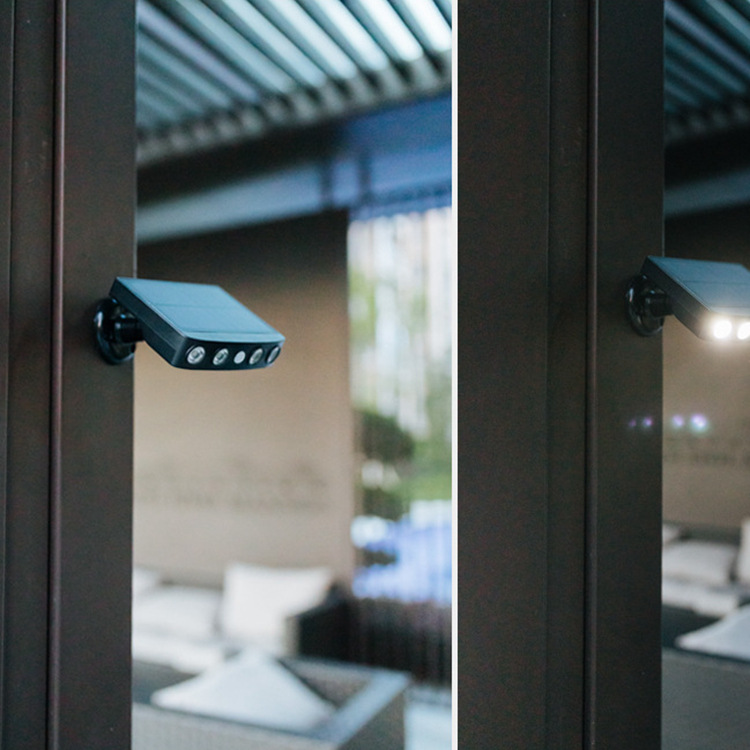 Cross-border new LED solar wall lamp courtyard garden waterproof lighting imitation monitoring spotlight human body induction street light
