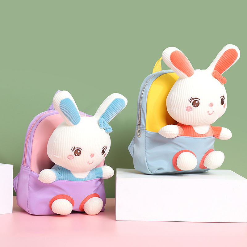 2023 new cartoon plush children's backpack kindergarten baby light schoolbag boys and girls baby schoolbag wholesale