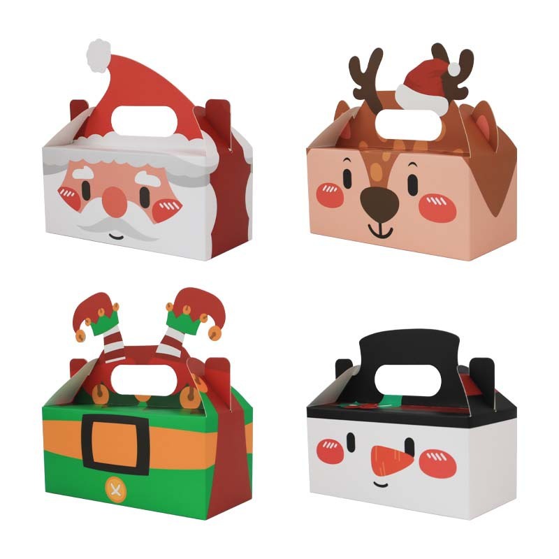 クリスマスシリーズのキャンディー箱クリスマスの新しい四角いプレゼント箱クリスマスの手にビスケットケーキの洋菓子箱を持っている|undefined