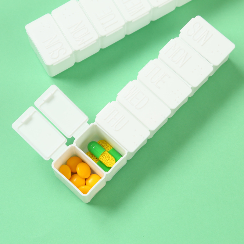 Wholesale weekly pill box strip-type 7-day pill box 7-grid sub-packing pill box convenient advertising storage box in stock