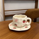 Strawberry flower cup and saucer