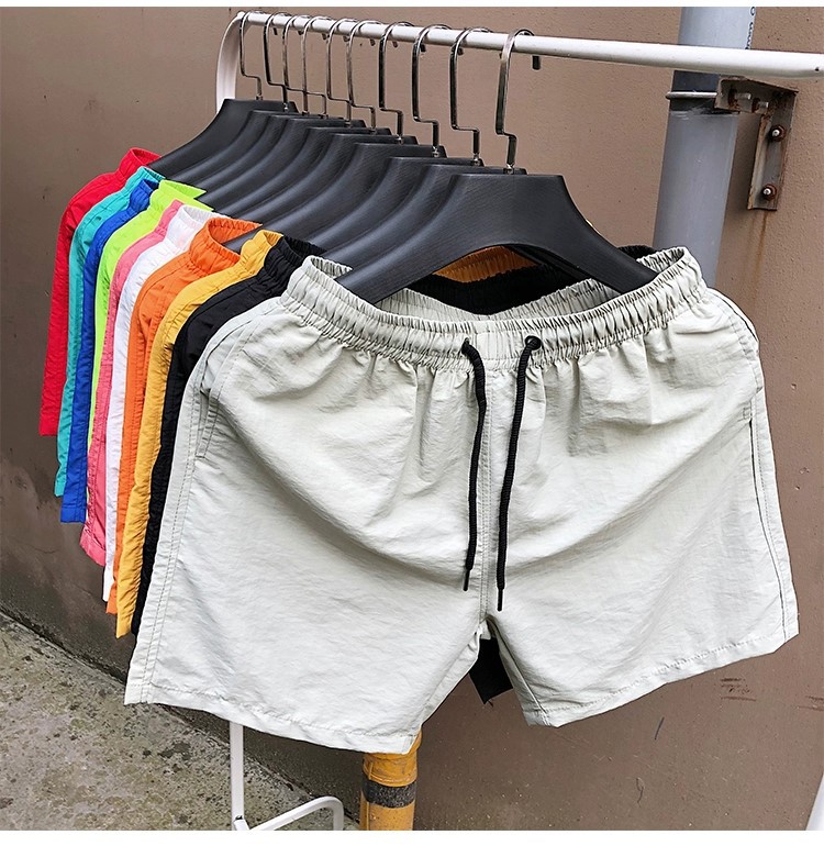 Factory direct 23 summer men's casual shorts candy color pants men's ten color Foreign Trade beach pants men's wholesale