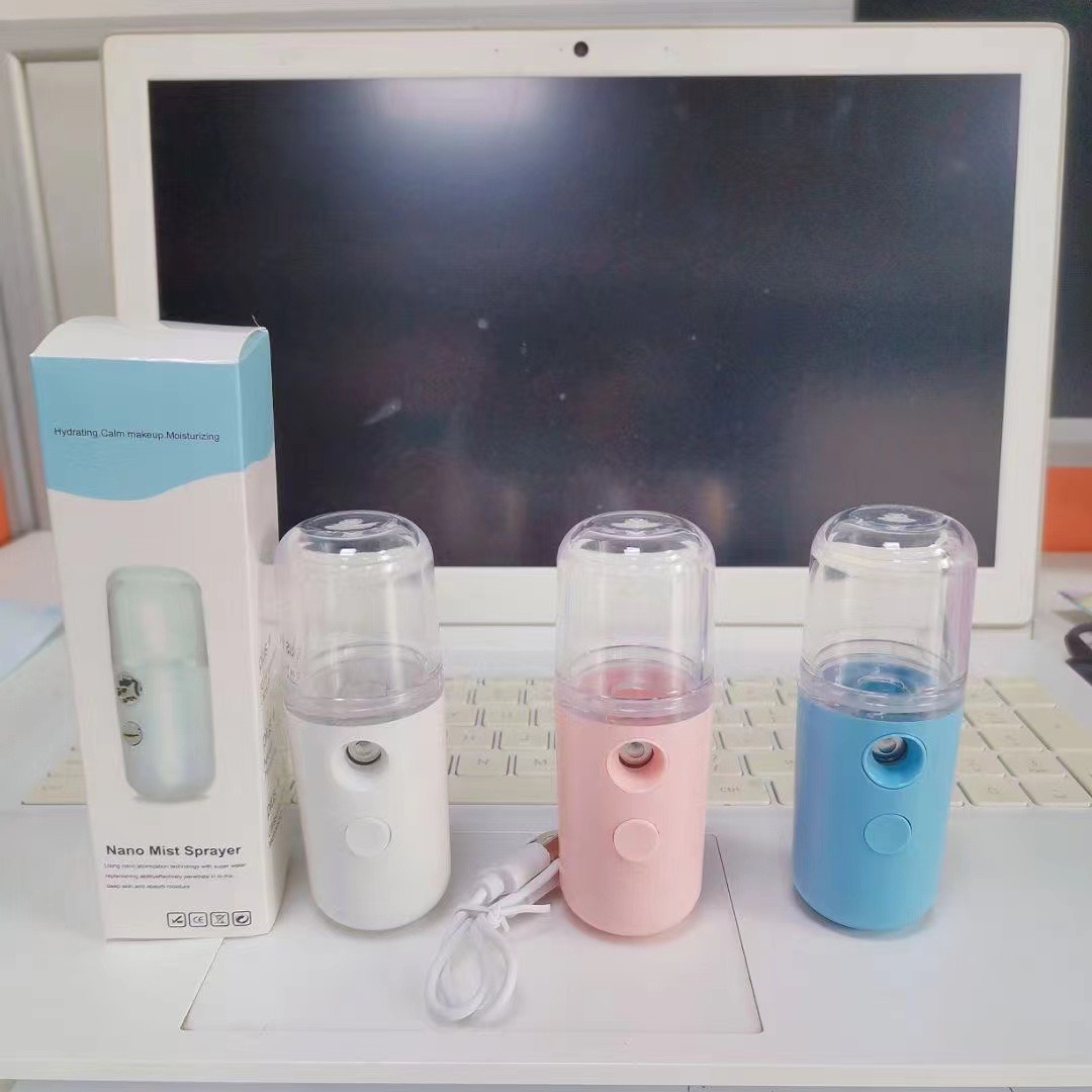 Foreign Trade Hot Sale Nano Spray Hydrating Instrument Face Humidifier Small Portable Charging Beauty Instrument Cold Spraying Machine