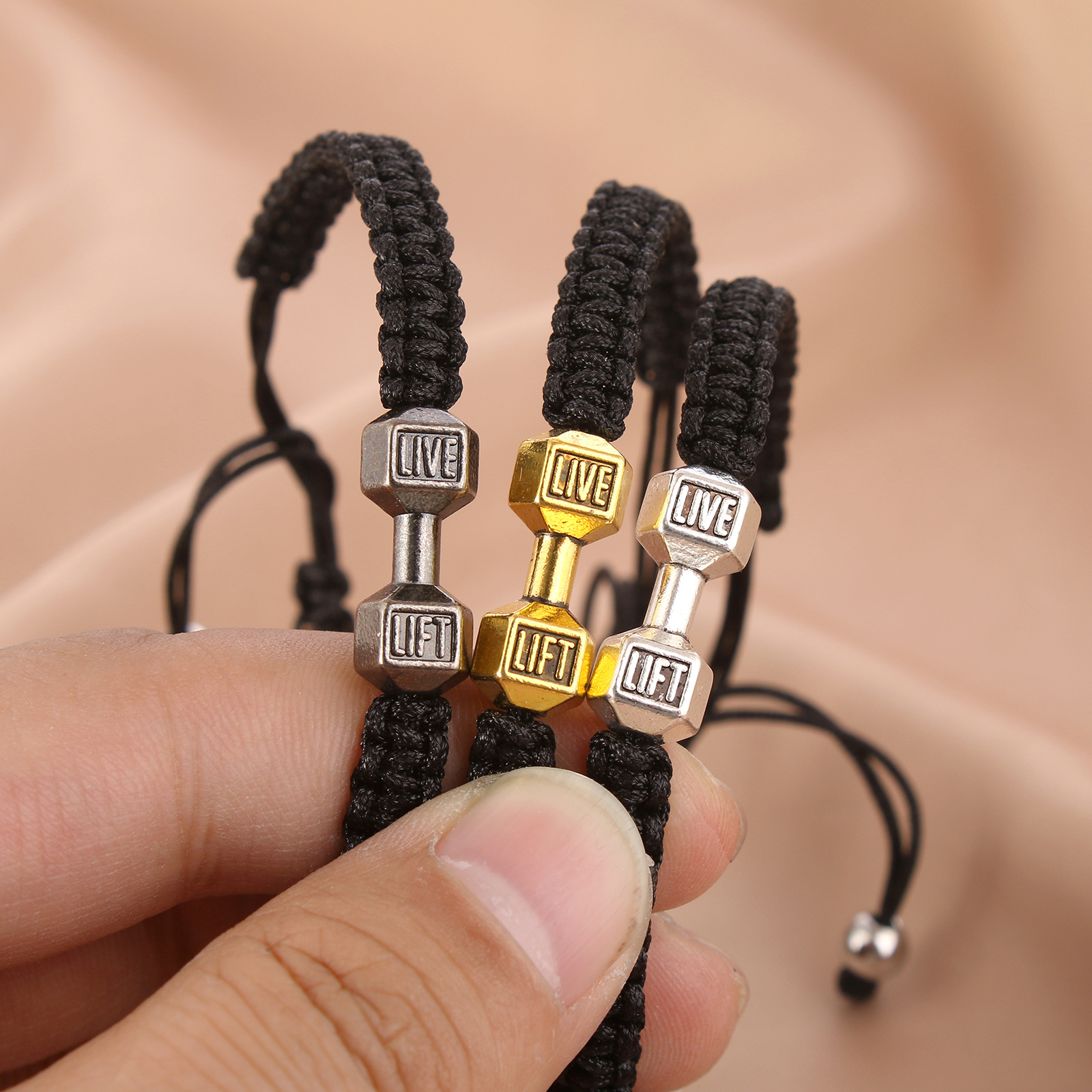 2022 European and American new simple alloy dumbbell hand-woven hand rope men's adjustable bracelet jewelry wholesale