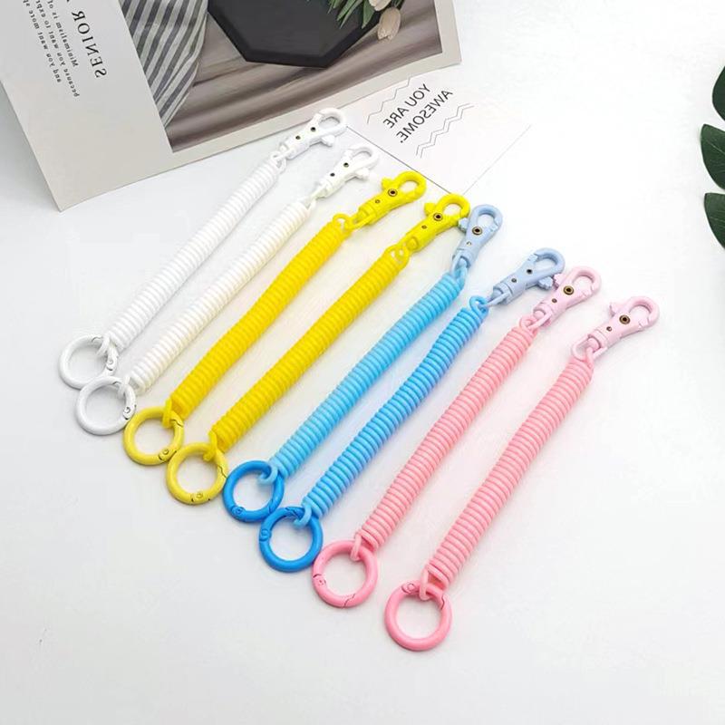 Factory wholesale plastic spring rope jelly color key chain bag card set lanyard key chain elastic anti-loss rope
